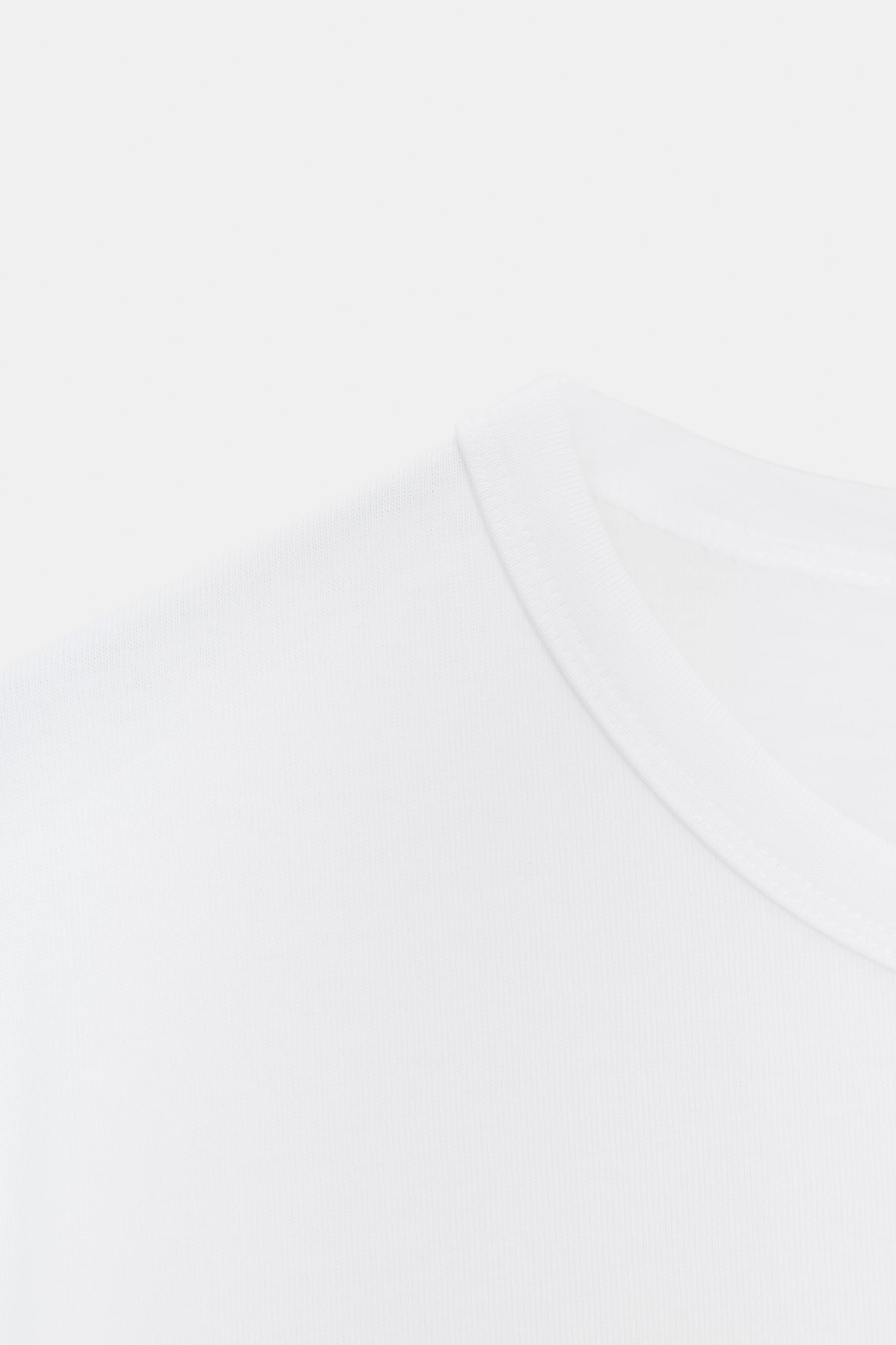 T-SHIRT ASYMÉTRIQUE À MANCHES COURTES